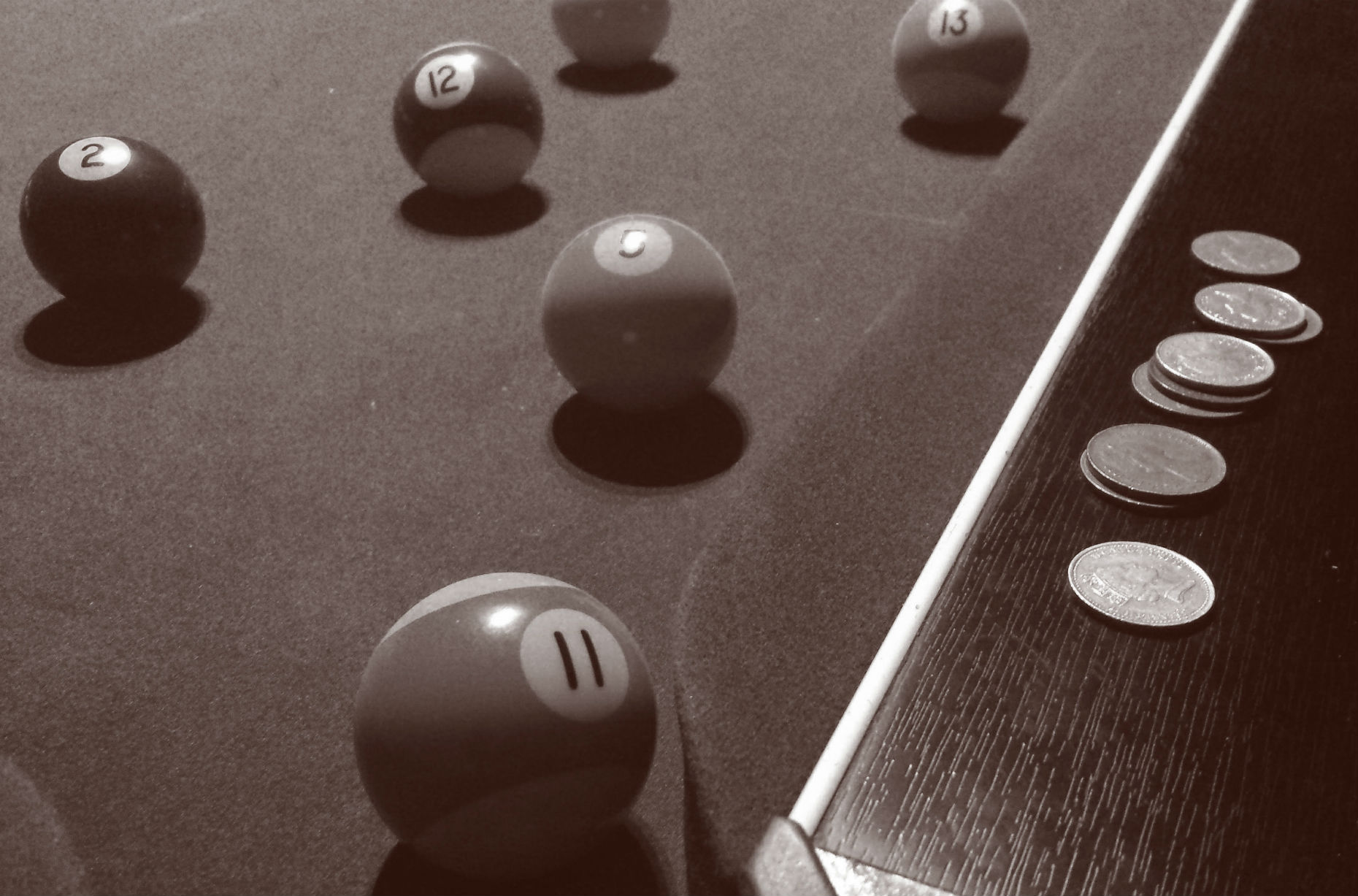 coins on pool table